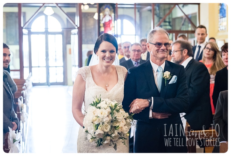 dad and daughter down the aisle